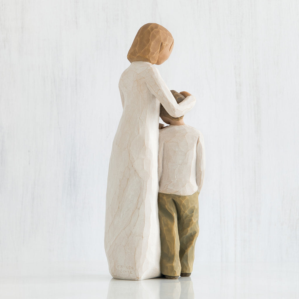 MOTHER AND SON FIGURINE